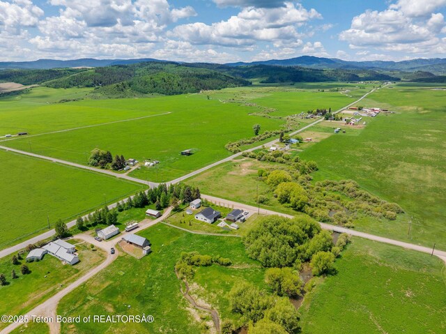 4326 State Line Rd, Freedom, WY 83120 - overview of rural landscape with mountains and agricultural land