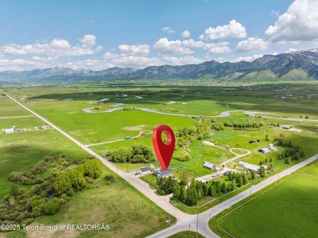 4326 State Line Rd, Freedom, WY 83120 - aerial view of sparsely populated area with a mountainous background
