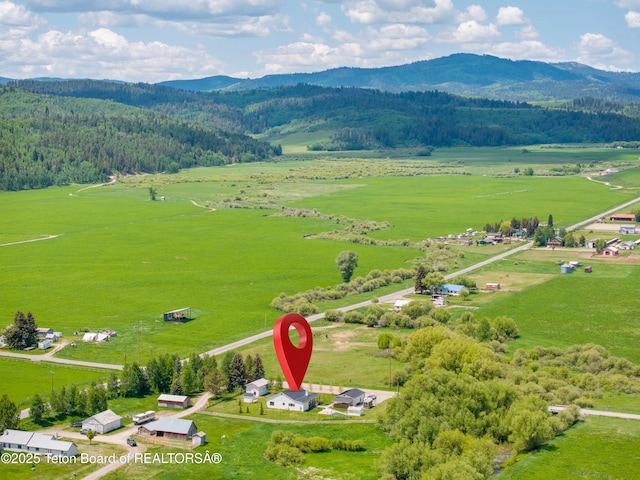 4326 State Line Rd, Freedom, WY 83120 - view of rural area featuring mountains and a forest