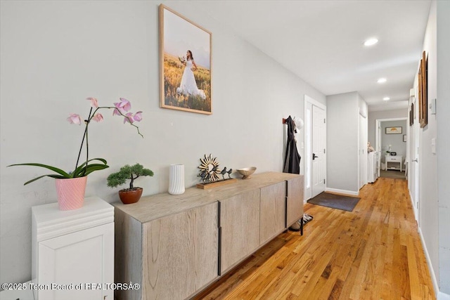2176 Corner Creek Ln Unit C, Jackson, WY 83001 - hall with light wood finished floors, recessed lighting, and baseboards
