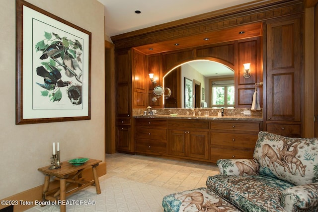 bathroom featuring double vanity