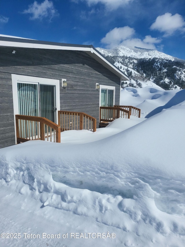 360 Wooden Spur Dr, Alpine, WY 83128 - view of snowy exterior featuring a deck
