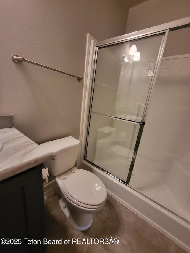 360 Wooden Spur Dr, Alpine, WY 83128 - full bath featuring an enclosed shower and vanity