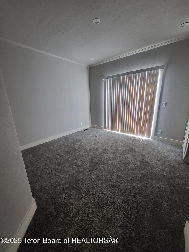 360 Wooden Spur Dr, Alpine, WY 83128 - unfurnished room featuring carpet flooring and crown molding