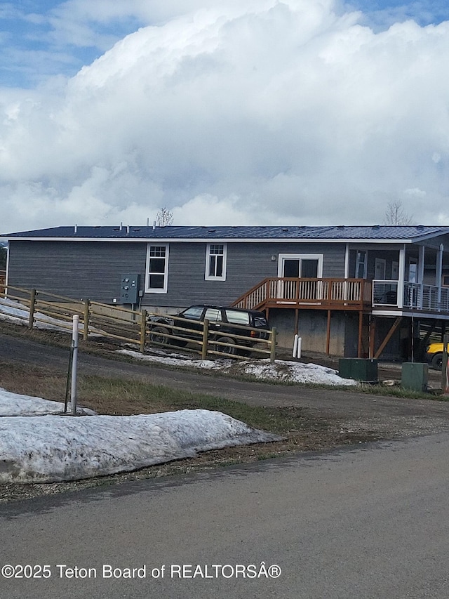 360 Wooden Spur Dr, Alpine, WY 83128 - manufactured / mobile home featuring a deck
