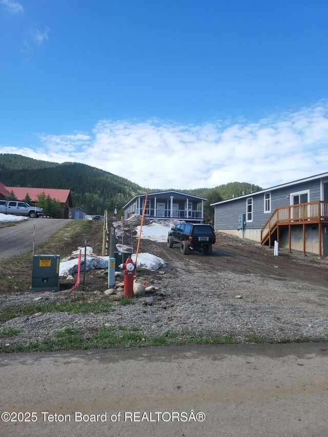 360 Wooden Spur Dr, Alpine, WY 83128 - manufactured / mobile home with a mountain view