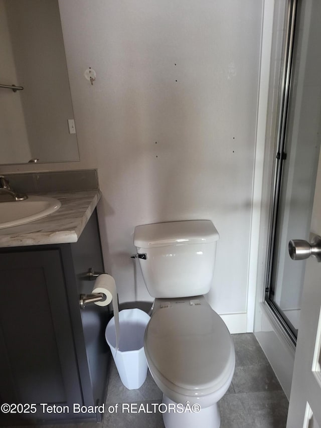 360 Wooden Spur Dr, Alpine, WY 83128 - bathroom with vanity and an enclosed shower