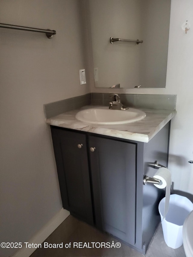 360 Wooden Spur Dr, Alpine, WY 83128 - bathroom featuring vanity and toilet