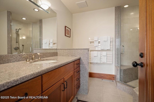 1987 N Spirit Dance Rd, Jackson, WY 83001 - full bath featuring tile patterned floors, vanity, a shower stall, and recessed lighting