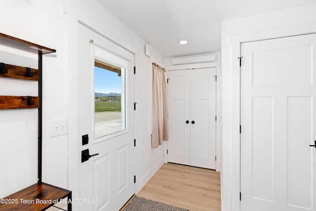 315 Meyers St, Thayne, WY 83127 - entryway with light wood finished floors and recessed lighting