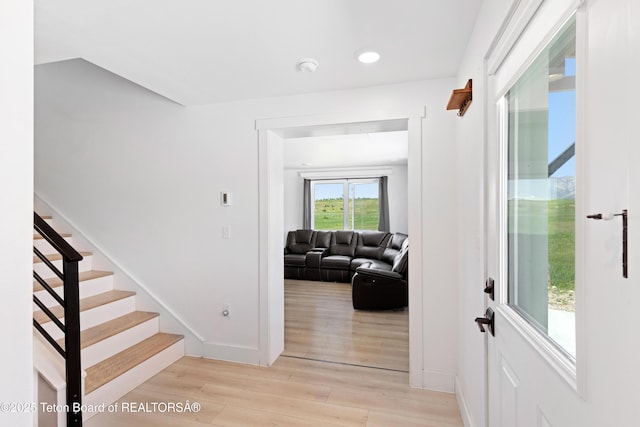 315 Meyers St, Thayne, WY 83127 - foyer entrance featuring wood finished floors, stairway, and recessed lighting