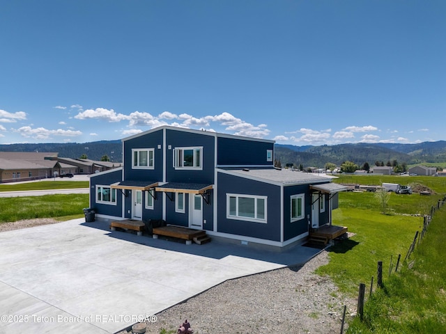 315 Meyers St, Thayne, WY 83127 - view of front of property featuring a mountain view and driveway