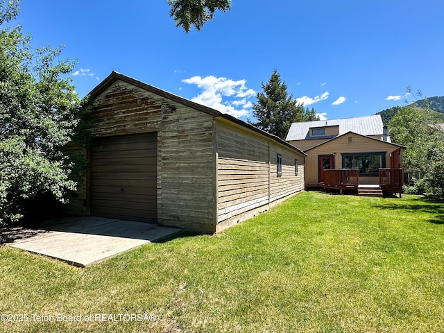 566 Jefferson St, Afton, WY 83110 - detached garage featuring driveway