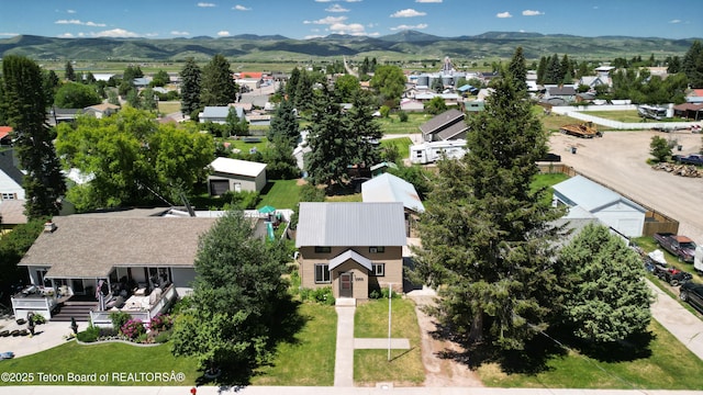 566 Jefferson St, Afton, WY 83110 - aerial view of residential area featuring mountains