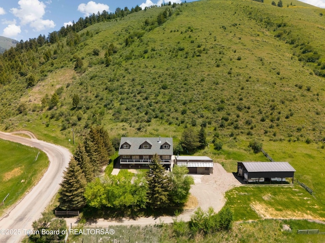 2840 E Dry Crk, Afton, WY 83110 - view from above of property featuring a heavily wooded area and a mountain backdrop