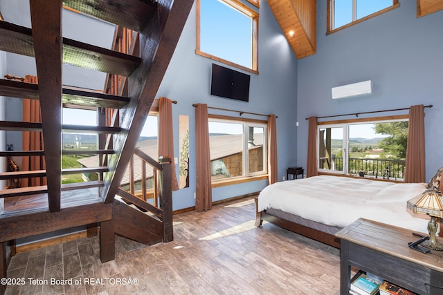 2840 E Dry Crk, Afton, WY 83110 - bedroom featuring high vaulted ceiling and wood finished floors