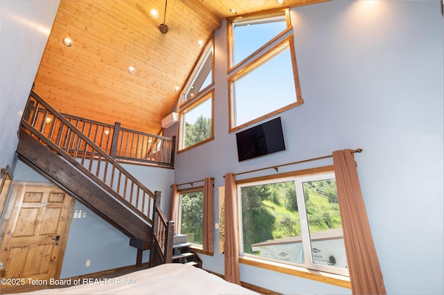2840 E Dry Crk, Afton, WY 83110 - stairs featuring high vaulted ceiling, wood ceiling, and recessed lighting