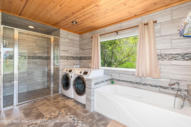 2840 E Dry Crk, Afton, WY 83110 - laundry room featuring wooden ceiling, tile walls, and separate washer and dryer