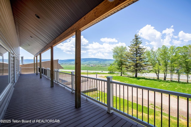 2840 E Dry Crk, Afton, WY 83110 - wooden deck with a mountain view and a yard