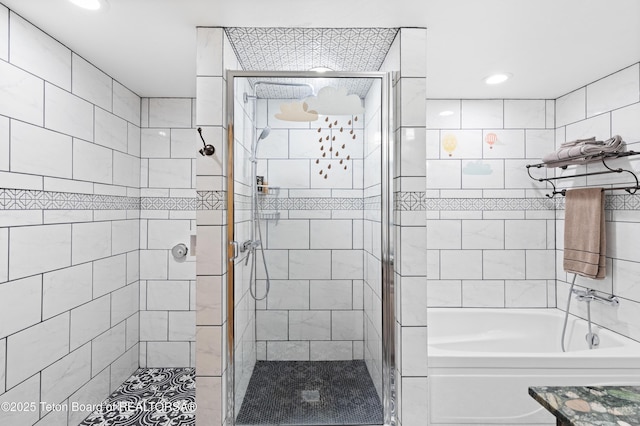 2840 E Dry Crk, Afton, WY 83110 - full bath with a tile shower, a bathtub, and recessed lighting