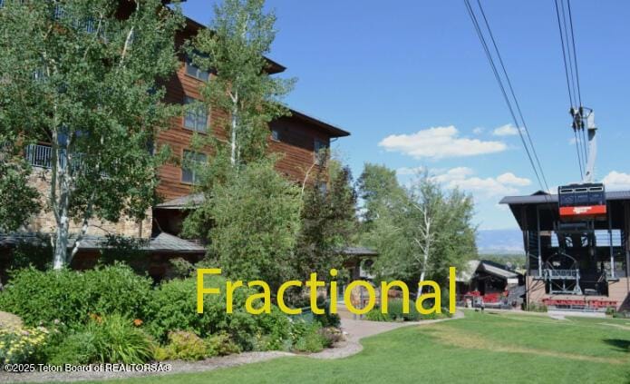 3340 W Cody Ln Unit 204, Teton Village, WY 83025 - community sign featuring a lawn