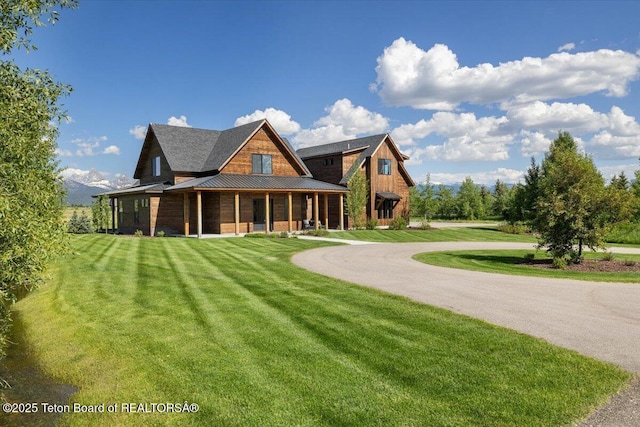 346 S Leigh Ranch Rd, Tetonia, ID 83452 - view of front of property with a front lawn, a standing seam roof, and a metal roof