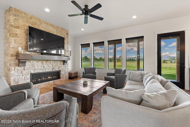346 S Leigh Ranch Rd, Tetonia, ID 83452 - living area with a fireplace, recessed lighting, a ceiling fan, and wood finished floors