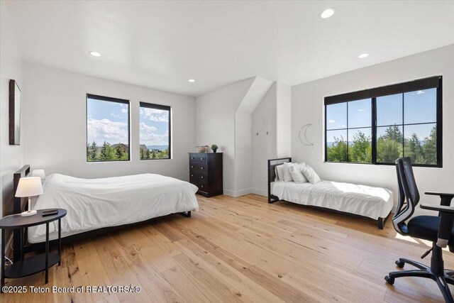 346 S Leigh Ranch Rd, Tetonia, ID 83452 - bedroom with light wood-style floors and recessed lighting