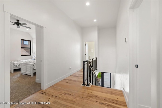 346 S Leigh Ranch Rd, Tetonia, ID 83452 - corridor with an upstairs landing, light wood-type flooring, and recessed lighting