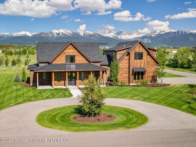 346 S Leigh Ranch Rd, Tetonia, ID 83452 - view of front of home featuring curved driveway and a mountain view