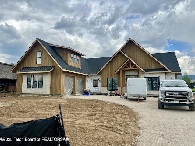 7 Cold Springs Rd, Victor, ID 83455 - view of front of property with a metal roof and driveway