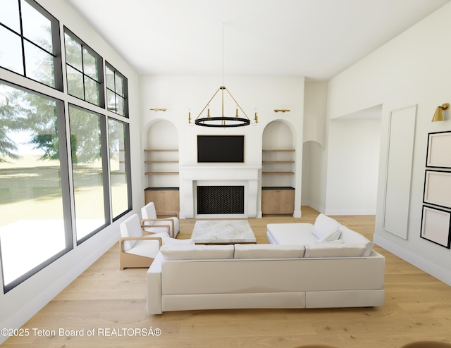 7 Cold Springs Rd, Victor, ID 83455 - living area with a chandelier, healthy amount of natural light, and light wood-type flooring