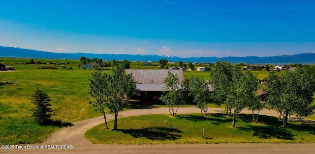 135 Butler Ln, Driggs, ID 83422 - view of property's community with curved driveway and a mountain view