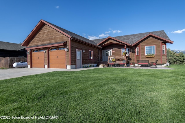 891 Paiute St, Driggs, ID 83422 - view of front of home with a garage and driveway