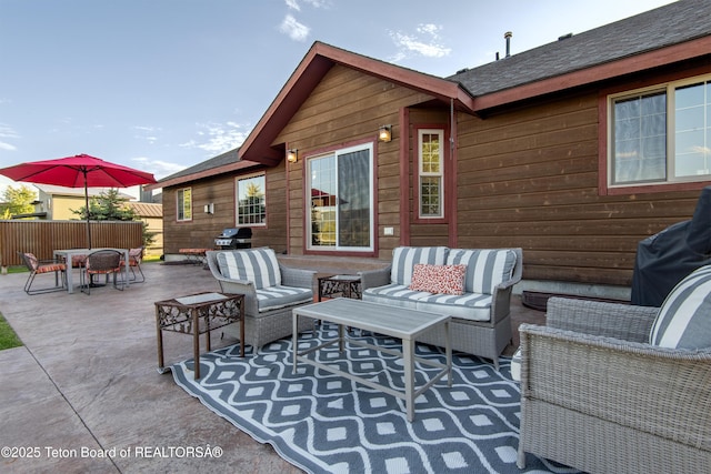 891 Paiute St, Driggs, ID 83422 - view of patio featuring outdoor lounge area, outdoor dining space, and area for grilling