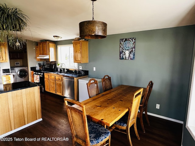 27 Chief Joseph, Daniel, WY 83115 - dining space with washer / dryer and dark wood finished floors