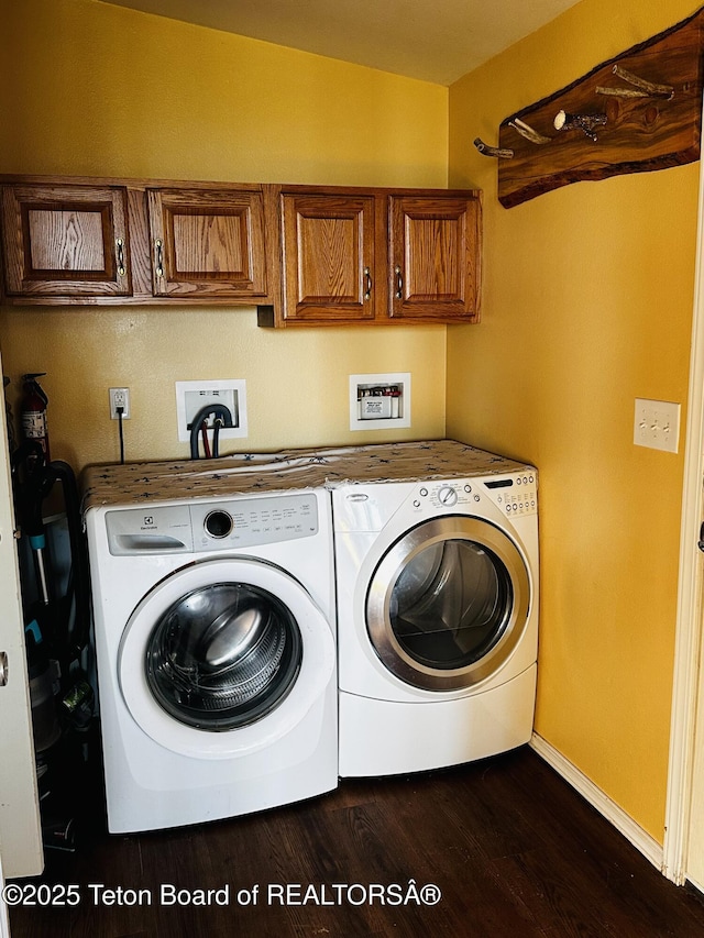 27 Chief Joseph, Daniel, WY 83115 - laundry area with cabinet space, washer and dryer, and dark wood finished floors