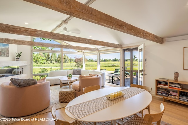 525 E Golf Creek Ln Unit 34, Jackson, WY 83001 - dining area featuring wood finished floors, ceiling fan, recessed lighting, healthy amount of natural light, and a sunroom