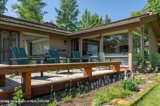 525 E Golf Creek Ln Unit 34, Jackson, WY 83001 - wooden terrace with outdoor dining area and area for grilling