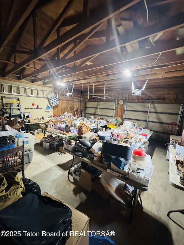 144 Blue Lake Cir, Alpine, WY 83128 - garage featuring a garage door opener