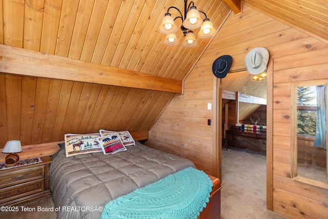 11 E St, Star Valley Ranch, WY 83127 - carpeted bedroom with wood walls, a chandelier, and wood ceiling