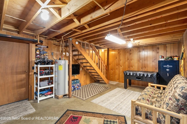 11 E St, Star Valley Ranch, WY 83127 - finished basement with water heater, stairway, and wood walls
