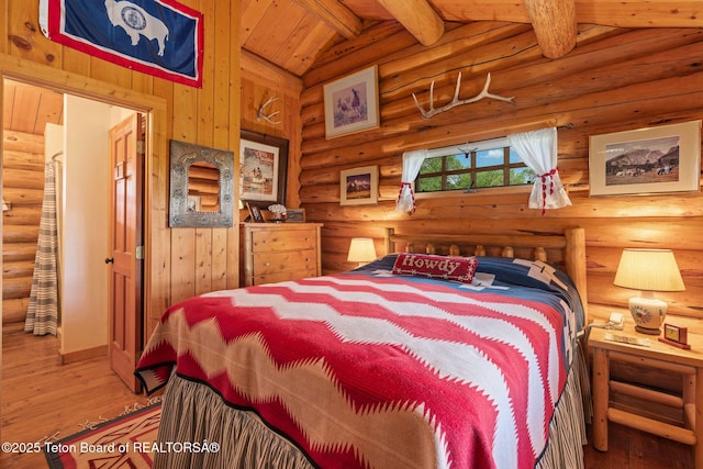 53 Schenck Ln, Dubois, WY 82513 - bedroom featuring rustic walls and wood finished floors