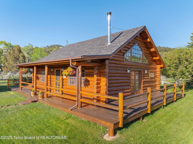 53 Schenck Ln, Dubois, WY 82513 - rear view of property with log exterior and a shingled roof