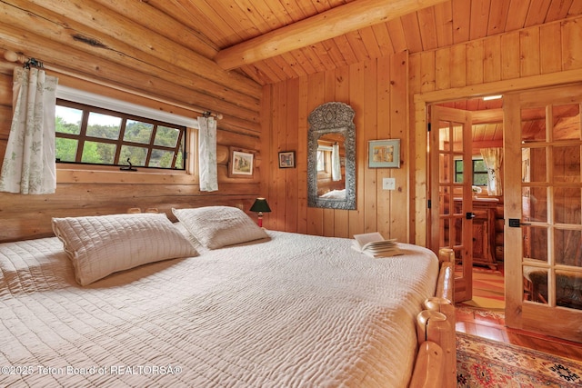 53 Schenck Ln, Dubois, WY 82513 - bedroom with a wooden ceiling with exposed beams and rustic walls