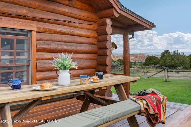53 Schenck Ln, Dubois, WY 82513 - deck featuring a mountain view and outdoor dining space