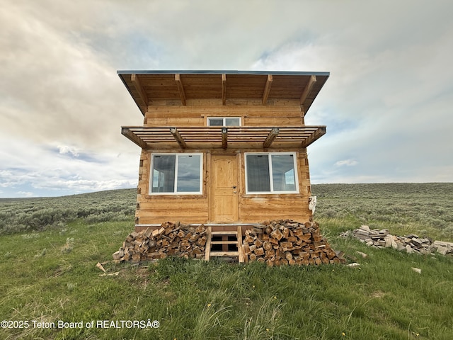 12 Beaver Ridge Cir, Daniel, WY 83115 - rear view of house featuring a pergola