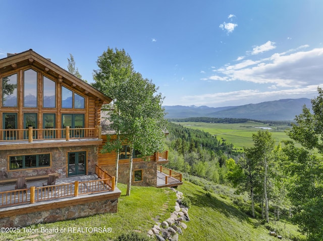 1520 N Pratt Rd, Jackson, WY 83001 - view of yard featuring french doors and a deck with mountain view
