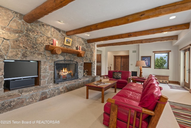 1520 N Pratt Rd, Jackson, WY 83001 - living room featuring carpet, a stone fireplace, beamed ceiling, and recessed lighting