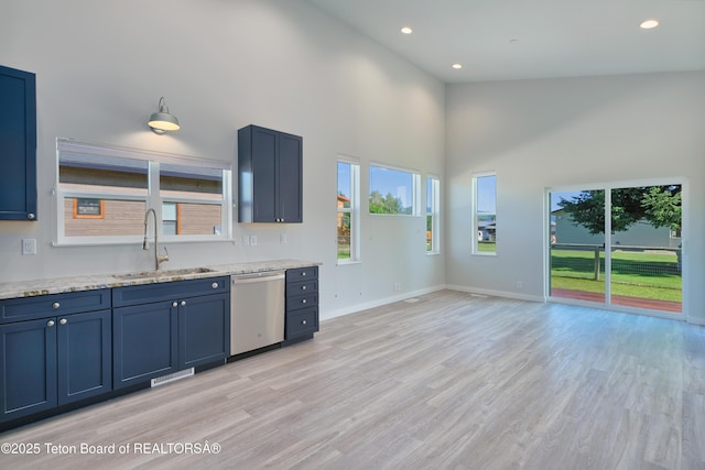 436 E Little Ave, Driggs, ID 83422 - kitchen with dishwasher, a high ceiling, plenty of natural light, light wood finished floors, and recessed lighting